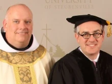 Fr. Sean Sheridan, TOR, president of Franciscan University of Steubenville, with honorary degree recipient Michael P. Warsaw on May 10, 2014. Photo courtesy of EWTN.