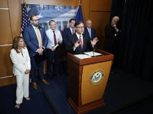 Speaker of the House Rep. Mike Johnson speaks as (left to right) House Republican Conference Chair Rep. Lisa McClain, Rep. Jason Smith, Rep. Jim Jordan, Rep. Mark Green, House Majority Leader Rep. Steve Scalise, and House Majority Whip Rep. Tom Emmer listen during a news briefing after a House Republican Conference meeting with President Donald Trump at the U.S. Capitol on May 20, 2025, in Washington, D.C.
