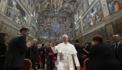 Pope Leo XIV exits the Sistine Chapel following a June 2, 2025, ceremony commemorating the life and legacy of Blessed Iuliu Hossu.