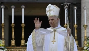 Pope Leo XIV waves to those gathered for Mass on the solemnity of Corpus Christi on Sunday, June 22, 2025, in Rome.