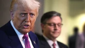 With Speaker of the House Mike Johnson by his side, President Donald Trump speaks to the press following a House Republican meeting at the U.S. Capitol on May 20, 2025, in Washington, D.C.