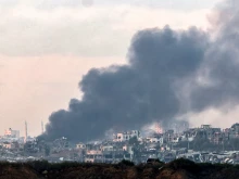 Smoke billows over the northern Gaza Strip during Israeli bombardment from southern Israel on Dec. 14, 2023, amid continuing battles between Israel and the militant group Hamas.