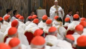 Pope Leo XIV addresses cardinals in the Sistine Chapel during his first Mass as Pope, Friday, May 9, 2025