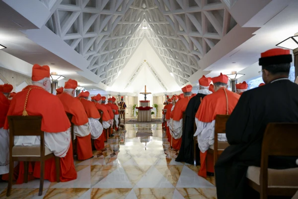 Cardinals pray before Pope Francis' body in the chapel of the Casa Santa Marta, Wednesday, April 23, 2025. Credit: Vatican Media